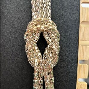 Shimmering glass beaded long necklace with a fun knot